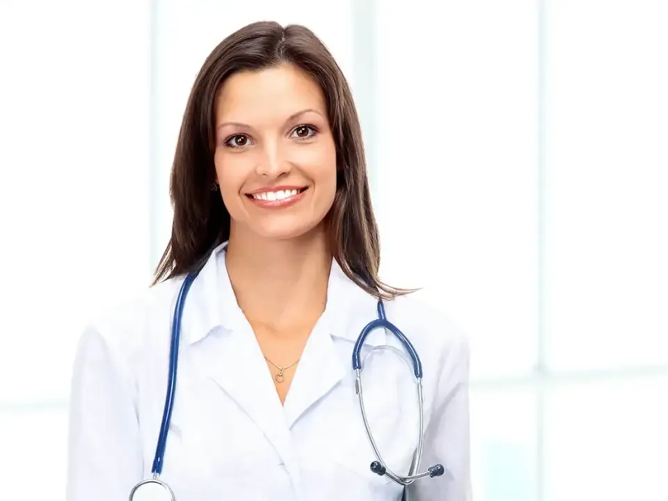 Friendly nurse wearing a stethoscope